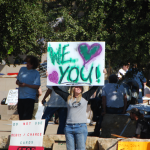 occupyaustin signs on Saturday (we heart you)