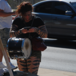 pictures of people at occupy austin (woman with drum and tatoos)
